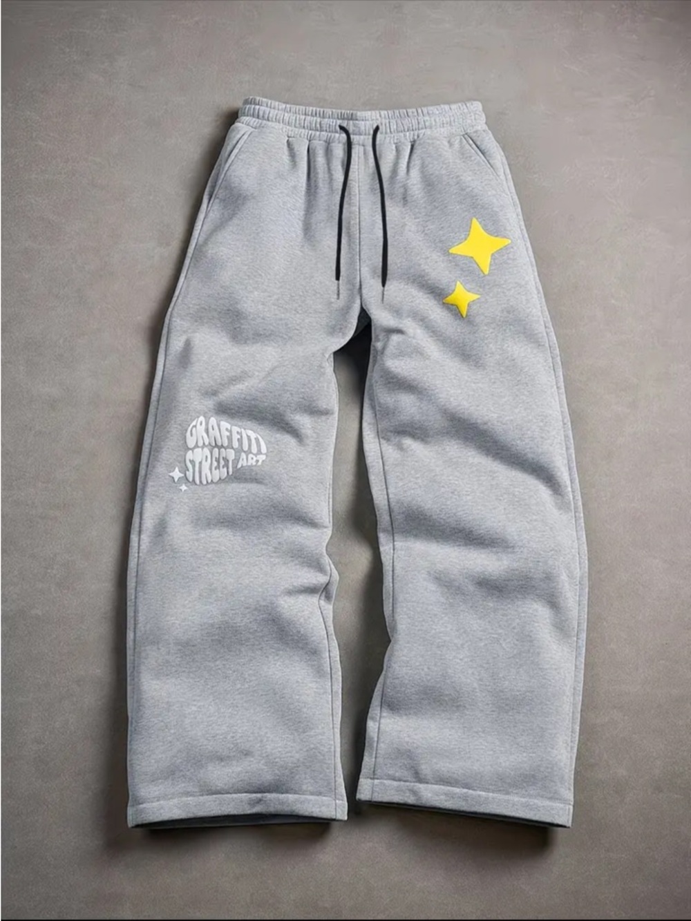 Men's Gray Graphic Sweatpants with Yellow Star Accents
